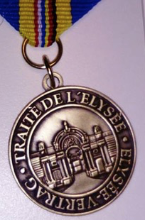 Honorer les acteurs du franco-allemand pour le 60ème anniversaire du Traité de l’Élysée.